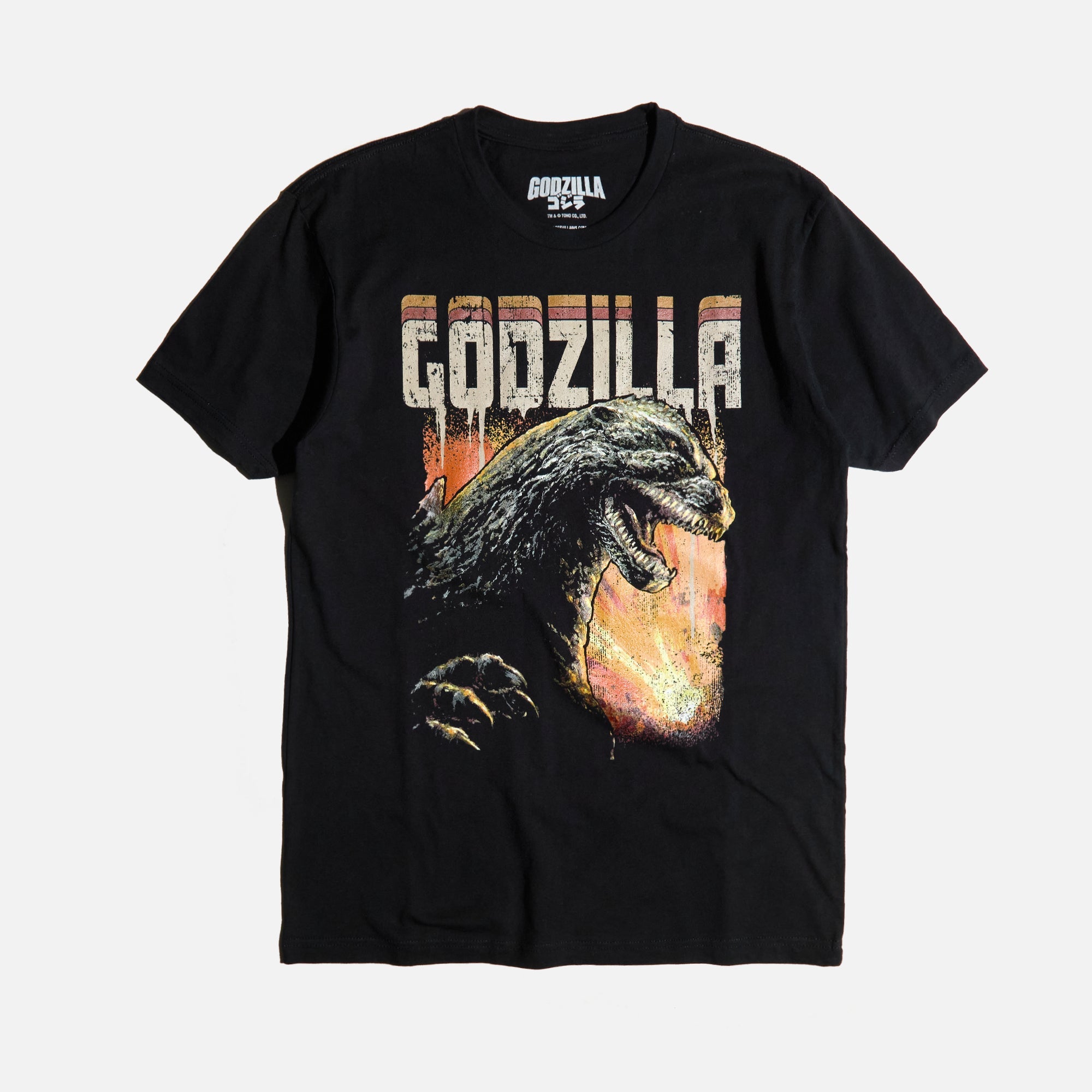 Black T-shirt featuring a roaring Godzilla with a fiery background and distressed "Godzilla" text
